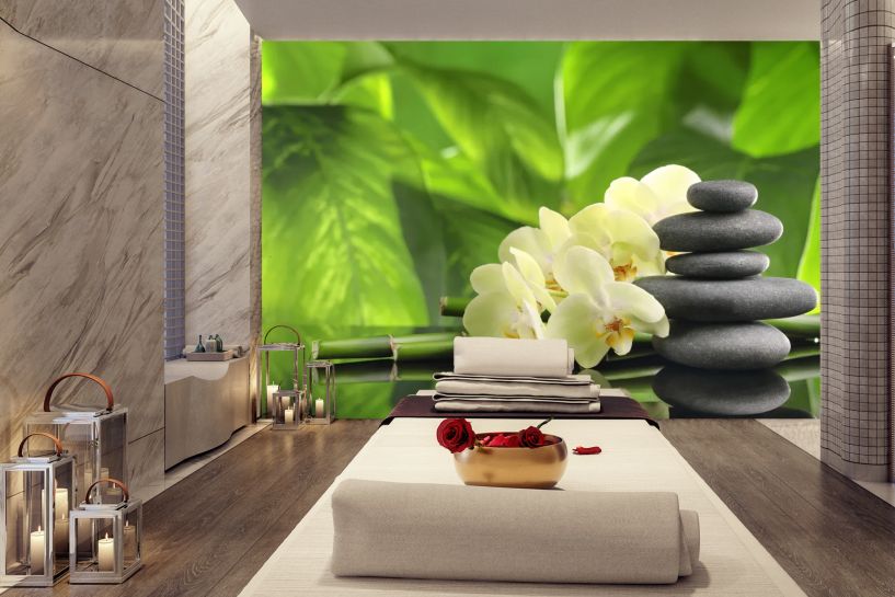 Kwiaty orchidei i kamienie w stylu SPA