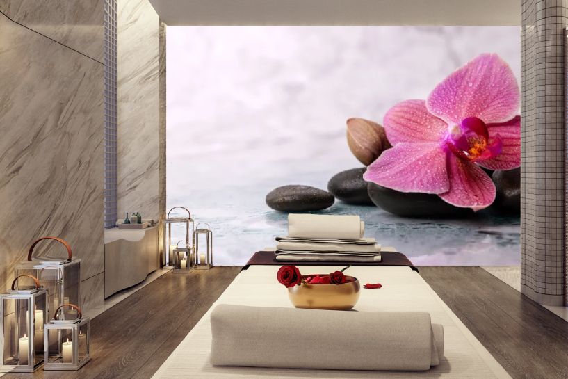 Orchidea i kamienie SPA na marmurowym tle